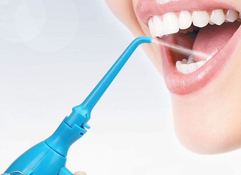 is water flossing better than string flossing